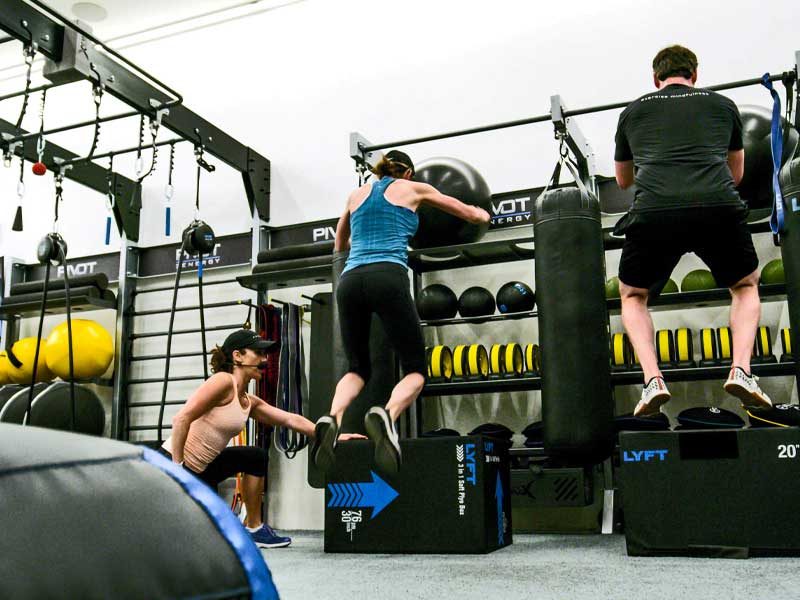 jumping onto plyo boxes during Pivot small group training lesson